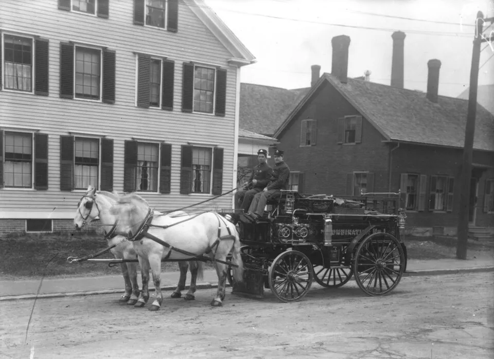 Ornate horse-drawn fire engine, early 1900s